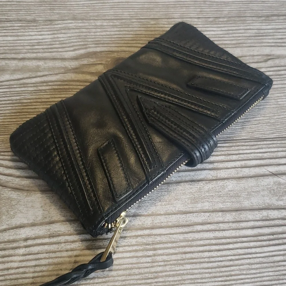 BVNDI black leather upper zip clutch